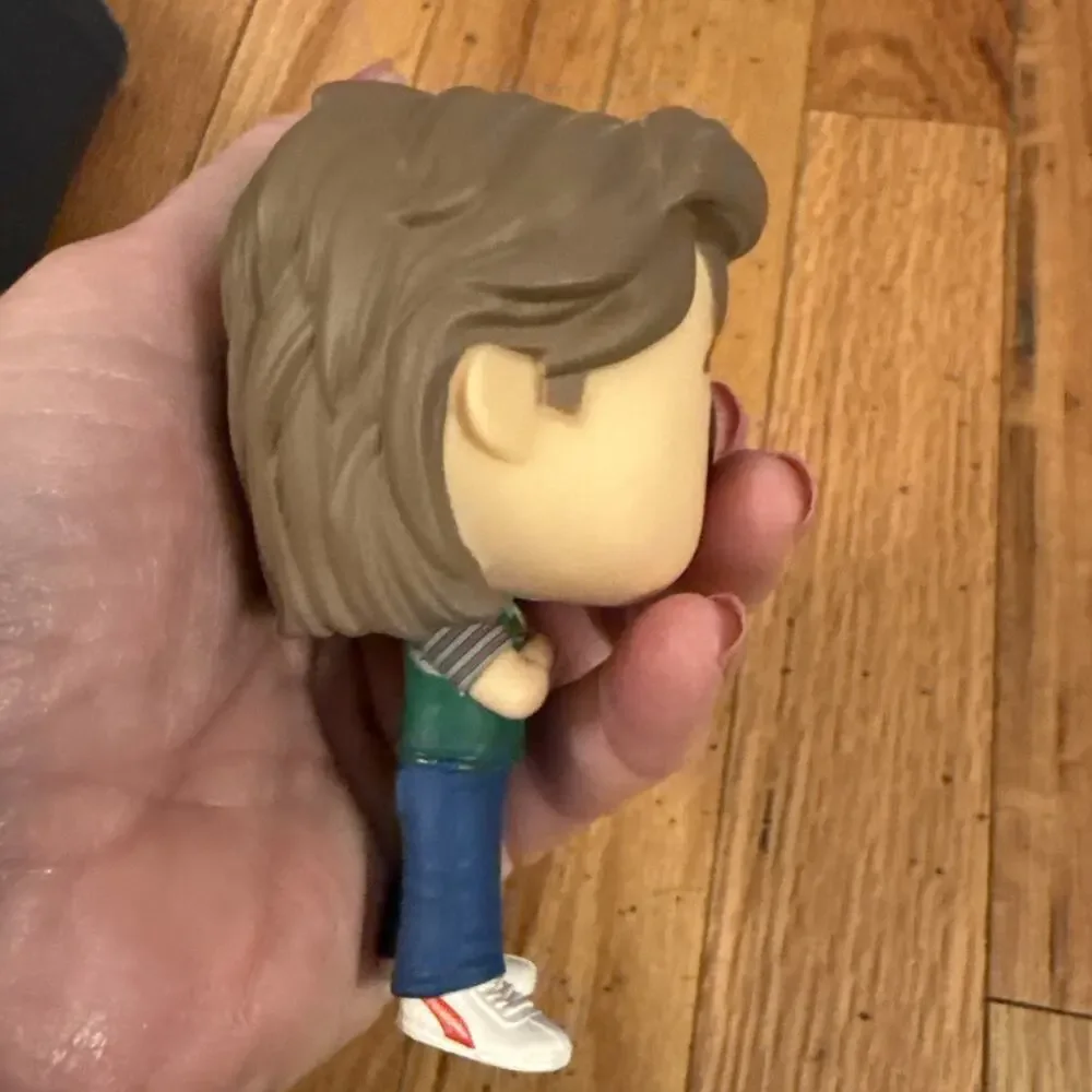 Funko Pop! Figure with Brown Hair, Cream Face, Green Vest, Blue Pants - Picture 5 of 7